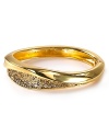 A mash-up of sparkle, texture and gilt tone make this Alexis Bittar bracelet a bold, have-forever statement piece.