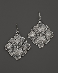 Intricately wrought sterling silver leaves form elegant earrings. By Buccellati.