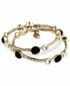 A glamorous combination of sparkling crystals, jet beads and golden tones creates this lovely set of 2 bangle bracelets from Jones New York. Crafted in worn gold tone mixed metal. Approximate diameter: 2-1/2 inches.