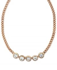 A shining example. Jessica Simpson's frontal necklace is crafted from gold-tone mixed metal with five glass crystal stones providing a gleaming, glamorous touch. Approximate length: 16 inches.