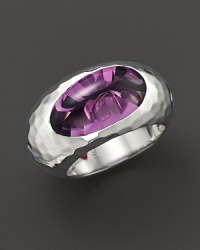 Faceted amethyst set in a sculpted sterling silver band. By Roberto Coin.