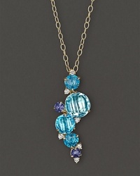 A brilliant fall of faceted iolite, blue topaz and diamond adds bright color to gleaming 18K yellow gold. By Carelle.