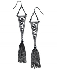 Ornate elegance. This pair of drop earrings from GUESS is crafted from hematite-tone mixed metal with glass crystal tassels and a filigree pattern for a refined touch. Approximate drop: 3-1/4 inches. Approximate diameter: 3/4 inch.