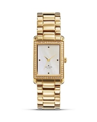 Take an uptown approach to accessorizing with this gold-plated watch from kate spade new york. It's rectangular design is city chic, while a glitzy bezel adds glamour.