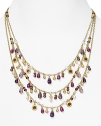 This Lauren Ralph Lauren necklace features three rows of multi-colored beads and pears and can be extended two inches. Wear it with a flowing, strapless maxi dress for a beautiful bohemian look.