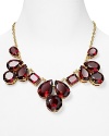 Talk about a statement piece. This kate spade new york bib necklace with ruby stones is sure to get people talking.