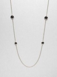 Faceted black onyx stones set in sleek sterling silver on a long link chain. Black onyxSterling silverLength, about 38Lobster clasp closureImported 