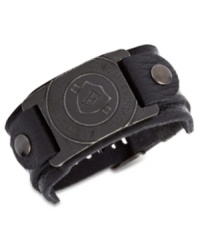 Go for the big and bold. Fossil's black leather bracelet features a logo face-plate crafted from hematite-tone mixed metal for a stylish touch. Approximate width: 1-1/2 inches.