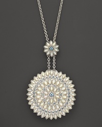 This unique pendant necklace from Paul Morelli doubles as a locket--a sparkling statement piece that lends instant luxury.