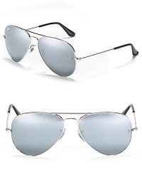 Get set for summer with the flash of Ray-Ban's aviator sunglasses. Adjustable nose pads to help secure fit.