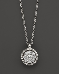 Diamond cluster pendant necklace in 14K white gold.