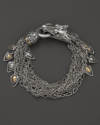 John Hardy's Naga bracelet lends fierce style with a dragon design crafted in sterling silver, accented with 18K yellow gold.