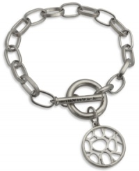 A must-have for subtle sophistication. T Tahari's charm bracelet from the Essentials collection features a circular pendant with an openwork design. Crafted in imitation rhodium mixed metal. Nickel-free for sensitive skin. Approximate length: 7-1/2 inches + 1-inch extender.