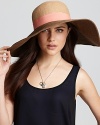 A large floppy hat with colorblock detail and contrast grosgrain ribbon trim for standout style.