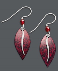 Add red-hot flair to your look in Jody Coyote's leaf-shaped earrings. Crafted in sterling silver, earrings feature red patina bronze drops and sparkling red crystals. Approximate drop: 1-1/2 inches.