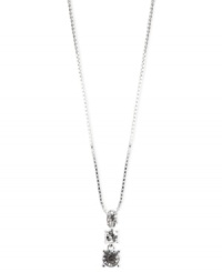 The sophistication of sparkle. A trio of round-cut glass accents are strung lovingly from a silver tone chain on this Anne Klein necklace. Crafted in silver tone mixed metal. Approximate length: 16 inches + 2-inch extender. Approximate drop: 1 inch.