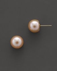 Cultured, peach freshwater pearl stud earrings.