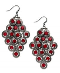 Warm up this season with red hues and dusky color. These drop earrings from Style&co. features hematite tone discs and red-colored glass crystals. Crafted in hematite tone mixed metal. Approximate drop: 3 inches.