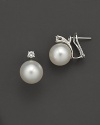 South Sea pearls with a gold and diamond loop. Omega back and post for pierced ears.