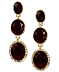 A luxe color combination makes these earrings from Anne Klein an alluring choice for your collection. The triple drop silhouette displays oval-cut glass and plastic stones. Clip-on backing for non-pierced ears. Crafted in gold tone mixed metal. Approximate drop: 2 inches.