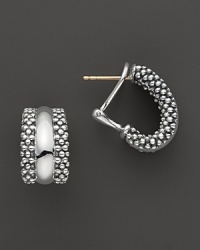 Sterling silver small caviar hoop earrings with omega back. Designed by Lagos.