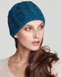 On the chilliest of days don't forget this cozy fish cable knit beanie with soft fleece lining.