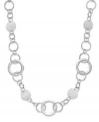 In the round. Style&co.'s long necklace conveys circular chic each time you wear it! Crafted in silver tone mixed metal, it's an alluring accessory for either daytime or evening. Approximate length: 37-1/2 inches.