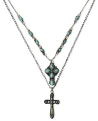 A welcome double cross. This pendant necklace from Lucky Brand, crafted from silver-tone mixed metal, features two crosses and is adorned with turquoise accents. Approximate length: 20 inches + 2-inch extender. Approximate drop: 1-1/4 inches.