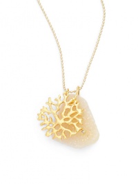 THE LOOKDruzy pendant with cubic zirconia accent Seafan detailBall chain18k yellow goldplated brassCircle claspTHE MEASUREMENTPendant width, about 1Pendant length, about 1.5Length, about 20ORIGINMade in USA