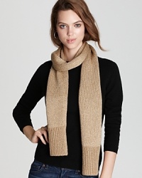 Shine on in MICHAEL Michael Kors' chic wool scarf with glints of gold and a logo plate.