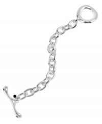 Go for an understated, yet stylish look with the link bracelet from Robert Lee Morris. It's crafted from silver-tone mixed metal and features a toggle closure. Approximate length: 7-1/2 inches.