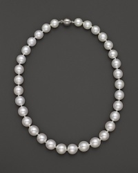 Cultured South Sea pearls in soft white join at a 14K white gold clasp.