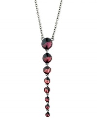 Purple proves to be quite pleasing in this Y-shaped necklace from GUESS. Crafted from hematite-tone mixed metal, the necklace's glass crystal stones dazzle. Item comes packaged in a signature GUESS Gift Box. Approximate length: 18 inches + 2-inch extender. Approximate drop: 4 inches.