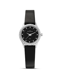 This Skagen watch is styled for maximum simplicity with a hint of sparkle, crafted of stainless steel with a sleek leather band as the compliment.