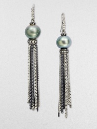 From the Midnight Pearl Collection. Gleaming chain tassels of blackened sterling silver dangle delicately from iridescent Tahitian cultured pearls with bands of diamonds above and below.Diamonds, .34 tcwTahitian pearls, 11mm-12mmSterling silverLength, about 3Ear wireImported