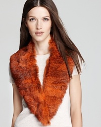 The ultimate in Burberry luxury, this plush fur stole delivers retro-inspired glamour in a burnt orange hue.