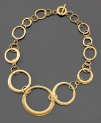 Stand out in a crowd. This gorgeous Lauren by Ralph Lauren circle necklace is crafted in goldtone mixed metal. Approximate length: 18 inches.