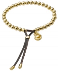 Inspire your look with one of the latest celebrity trends. Michael Kors' beautifully-beaded good luck bracelet is crafted in gold tone mixed metal with an adjustable brown leather clasp. Bracelet also stretches to fit wrist. Approximate diameter: 2-1/2 inches.