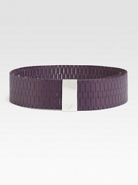 A supple leather design detailed in chic perforations and a logo engraved, metal buckle. Width, about 2¼Imported 