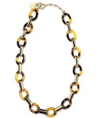 Marvelously modern. This Anne Klein necklace harnesses the beauty of golden hues and trendy tortoise to perfection. Crafted in gold tone mixed metal with tortoise resin links. Approximate length: 16-inches + 2-inch extender.