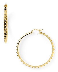 Inject some serious edge into your daytime look with this pair of spiked hoop earrings from nOir. In gold plate, it's hard to find an outfit these tough-chic beauties wouldn't work with.