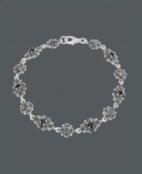 Flaunt good looks in fabulous filigree. Genevieve & Grace bracelet features an intricate link chain that highlights onyx center stones (3 mm) and glittering marcasite. Crafted in sterling silver. Approximate length: 7-1/2 inches.