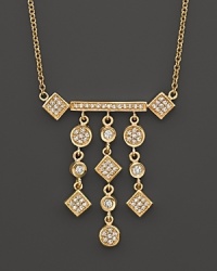 Art-deco inspired 14K yellow gold necklace set with diamonds.