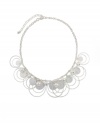 You'll come full circle--and look completely chic!--in this paillette sandblast necklace with beaded embellishments from Style&co. Crafted in silver tone mixed metal. Approximate length: 16 inches + 3-inch extender. Approximate drop: 1-1/2 inches.