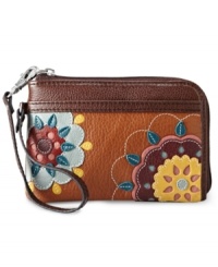 This free-spirited design from Fossil gives a nod to '70s flower power fashion. Rich leather is adorned with whimsical floral patchwork, while the versatile wristlet strap provides a hands-free look.