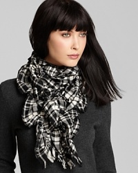 Turn up the volume of your cold weather look in Lauren Ralph Lauren's puckered, plaid scarf.