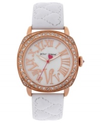 Fashion that warms your heart. This darling watch from Betsey Johnson shines with sparkling crystals and rose-gold tones.