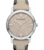 Neutral chic mixed with check patterns: a stylish and precise Burberry timepiece.