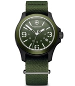 Nature is no match for you. Arm yourself with this ultra-durable watch by Victorinox Swiss Army. Olive green nylon strap and round olive green nylon fiber case with anti-reflective mineral crystal and aluminum bezel. Olive green dial features numerals at three, six and nine o'clock, stick indices, date window, military time, three hands and logo. Swiss quartz movement. Water resistant to 100 meters. Three-year limited warranty.