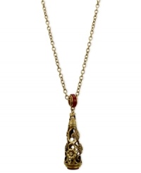 Ornate opulence. T Tahari's pendant necklace, part of the Deco Lace Collection, is crafted from gold-tone mixed metal with red glass crystal and Bordeaux accents for a stunning effect. Approximate length: 36 inches. Approximate drop: 3-1/8 inches